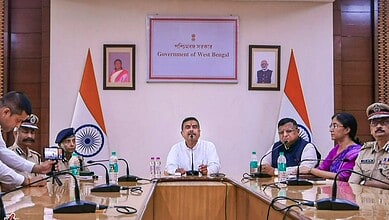 West Bengal Chief Minister Suvendu Adhikari, centre, addresses a press conference, in Howrah. (CMO via PTI Photo)