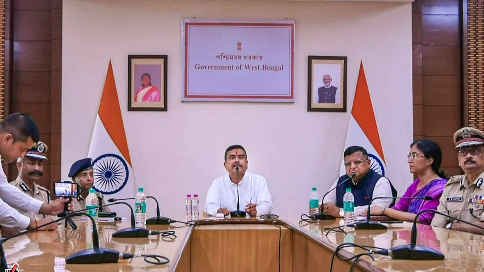 West Bengal Chief Minister Suvendu Adhikari, centre, addresses a press conference, in Howrah. (CMO via PTI Photo)