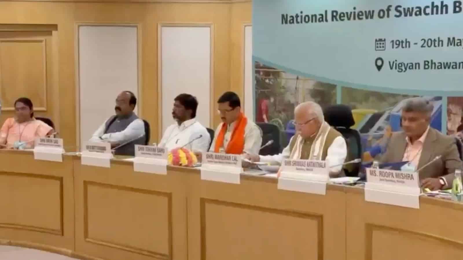 Panel of officials at the National Review of Swachh Bharat, Vigyan Bhawan, discussing sanitation initiati.