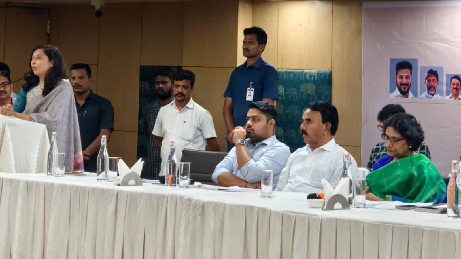 Engaged panel discussion at The Siasat Daily event with diverse speakers and audience members.