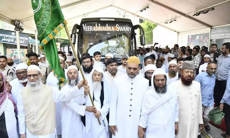 The Siasat Daily: Religious leaders and community members gather around a tractor at a public event.