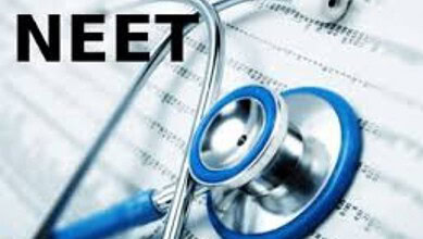 Stethoscope and NEET exam papers on desk, highlighting exam security ahead of NEET UG.