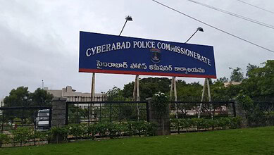 Signboard of Cyberabad Police Commissionerate with Telugu and English text.