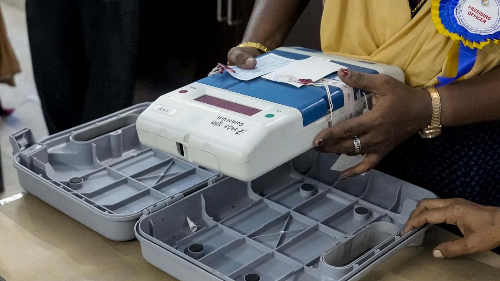 Electronic voting machine, election, voting process, democracy, polling station.