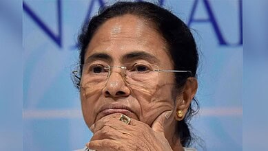 An image of Mamata Banerjee with a serious expression, highlighting political tensions during the assembl.