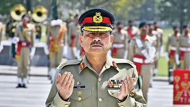 Pakistani military officer in uniform during a formal parade, symbolising national pride and military str.