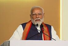 Prime Minister Narendra Modi speaking at a public event in Hyderabad, addressing the crowd during his vis.