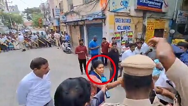 A woman activist detained during protest against PM Narendra Modi's convoy in Secunderabad, surrounded by.