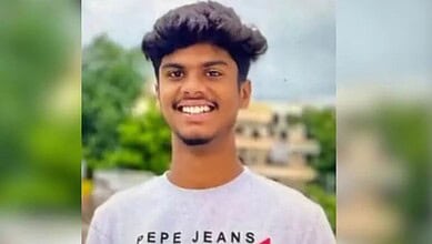 A young man smiling outdoors, related to the Hyderabad engineering student murder case.