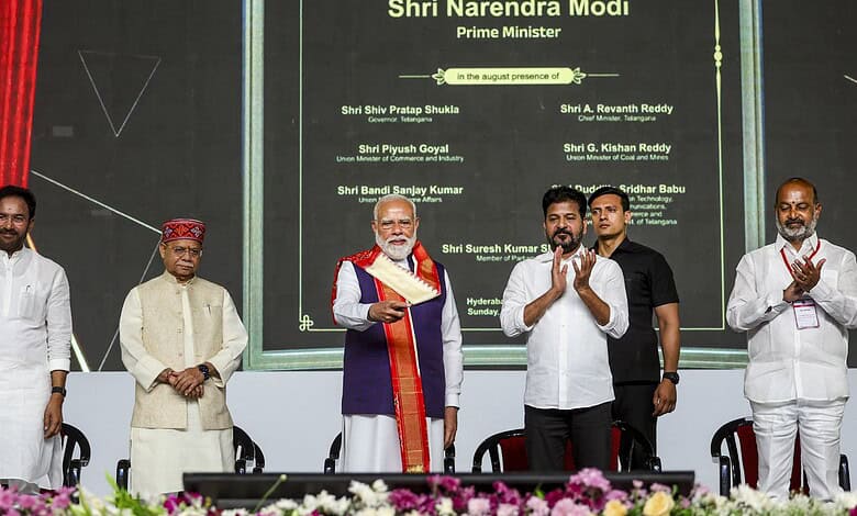 Modi at an official event, with political leaders, during a government function in India.