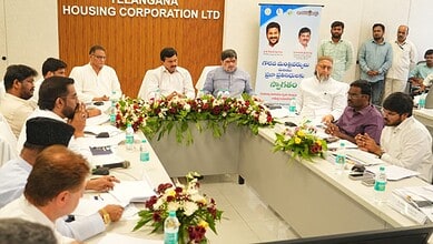 A meeting of officials and stakeholders at Telangana Housing Corporation LTD office, discussing housing d.