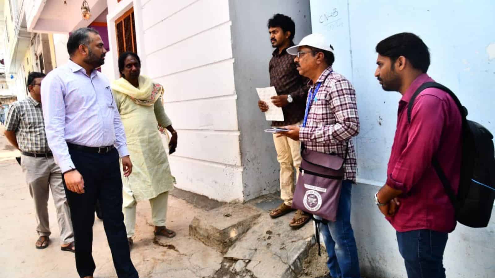 GHMC Commissioner RV Karnan interacts with people during census enumeration