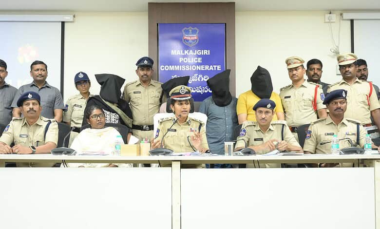 Police officials and officers at a press conference in Malkajgiri, Hyderabad, India.