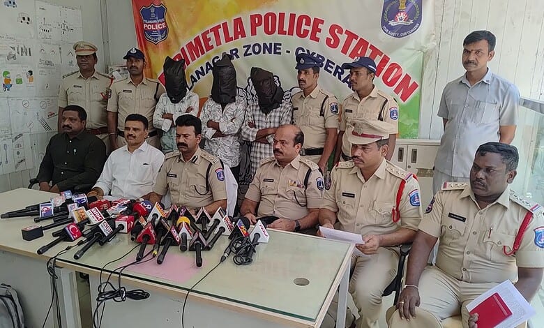 A police press conference at Metla Police Station with officers and suspects present.