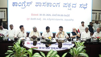 Enhanced image of a formal meeting with multiple officials seated at a conference table, discussing polic.
