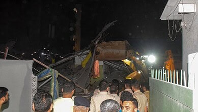 Police personnel at the collapsed site in Delhi