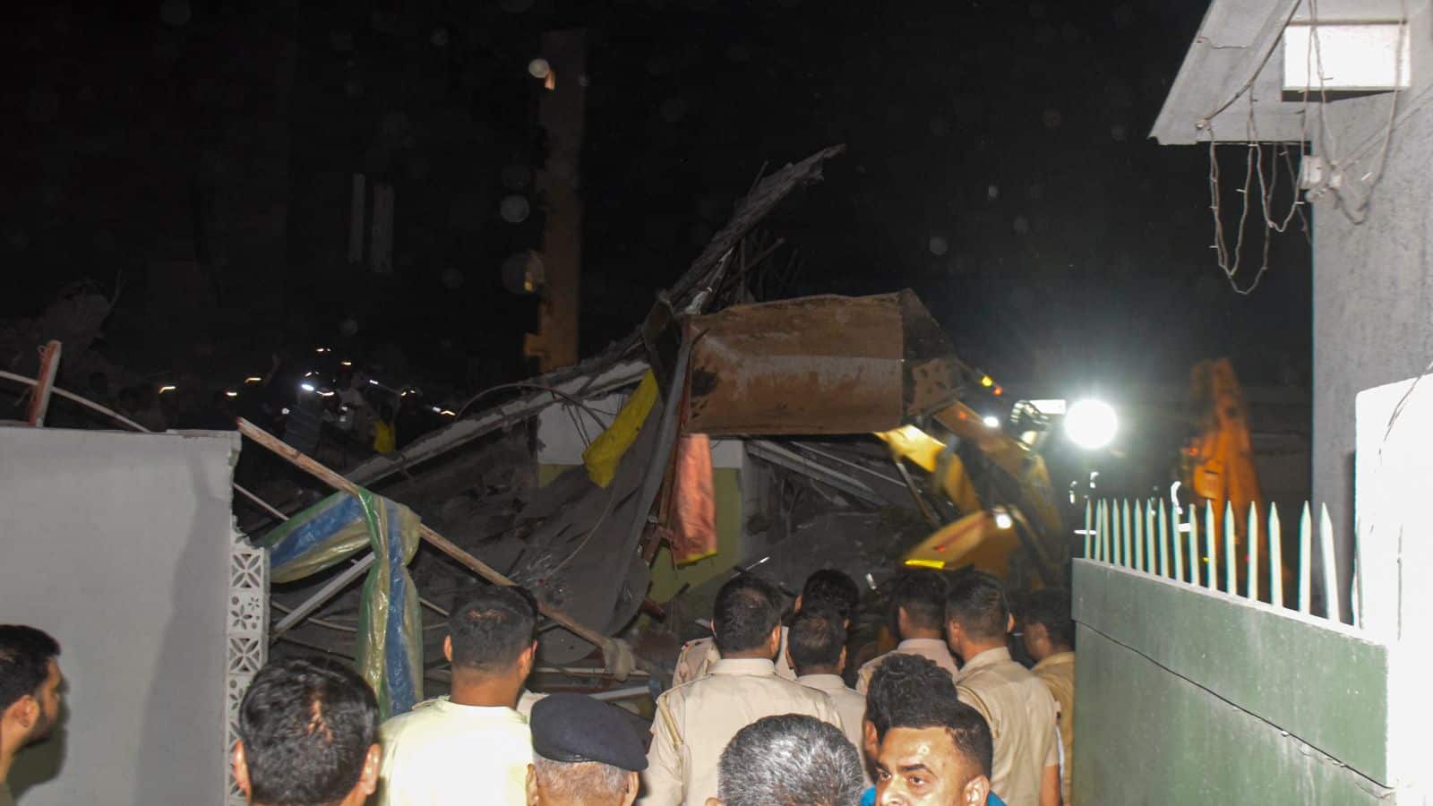 Police personnel at the collapsed site in Delhi