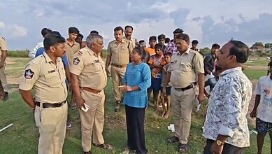 Police inquire with residents regarding the drowning incident
