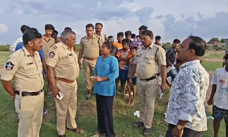 Police inquire with residents regarding the drowning incident