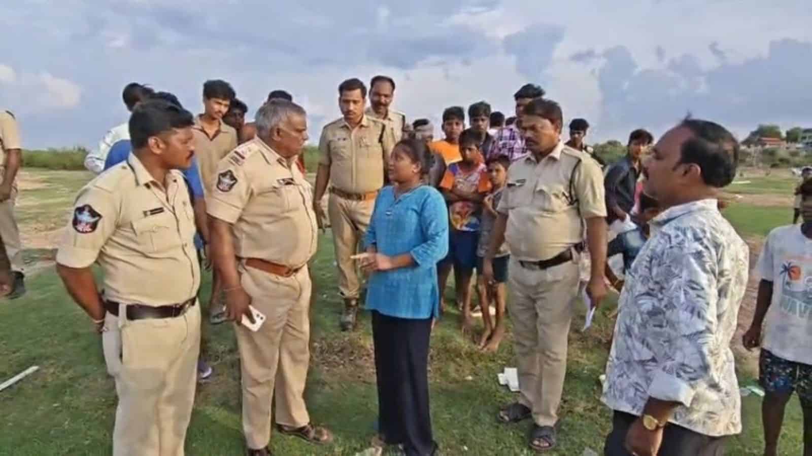 Police inquire with residents regarding the drowning incident