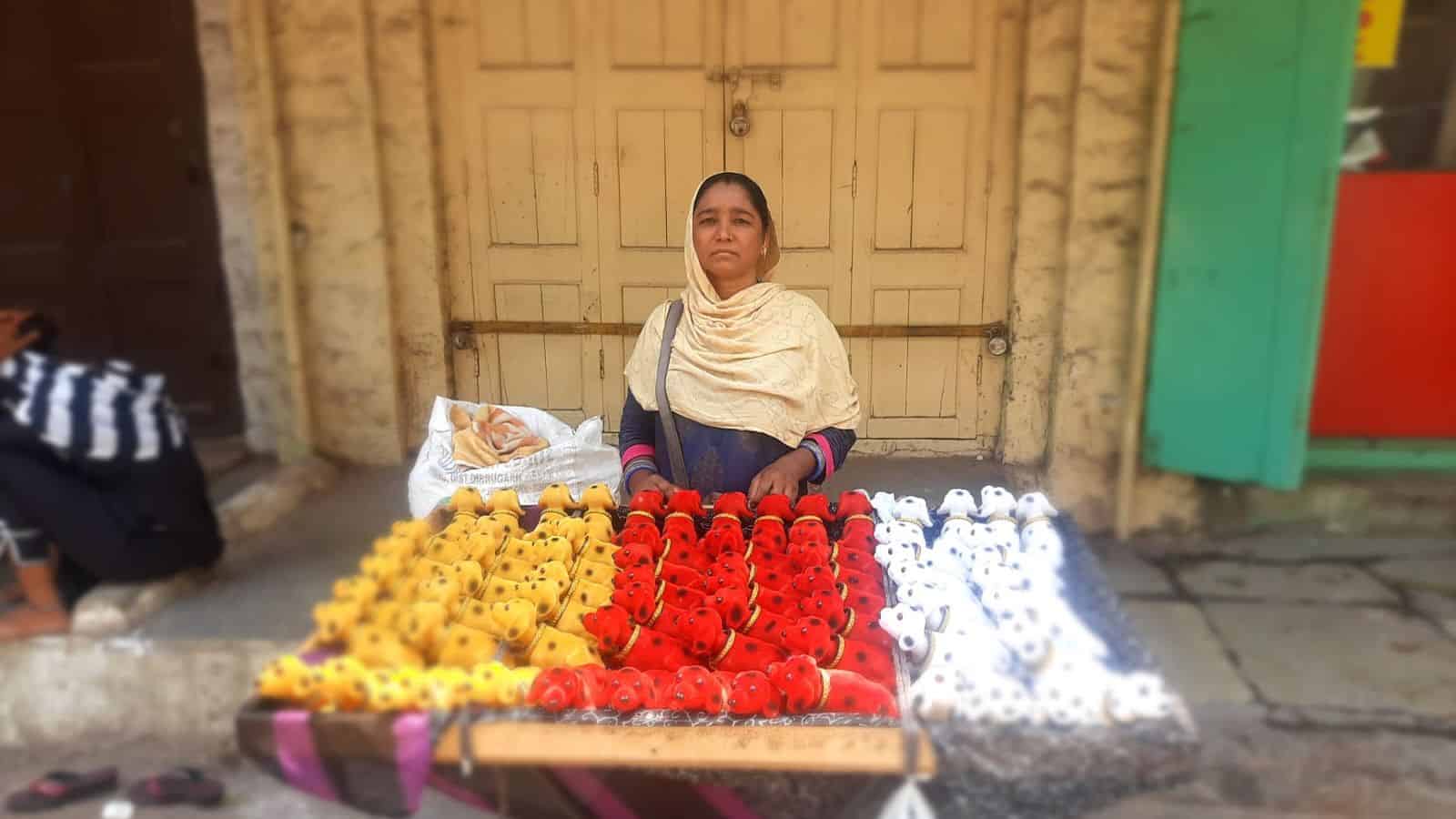 Sabi Devi with her soft toys at the Charminar