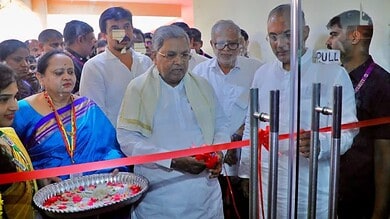 Prominent Indian leader inaugurating a new facility with diverse group of officials and attendees.