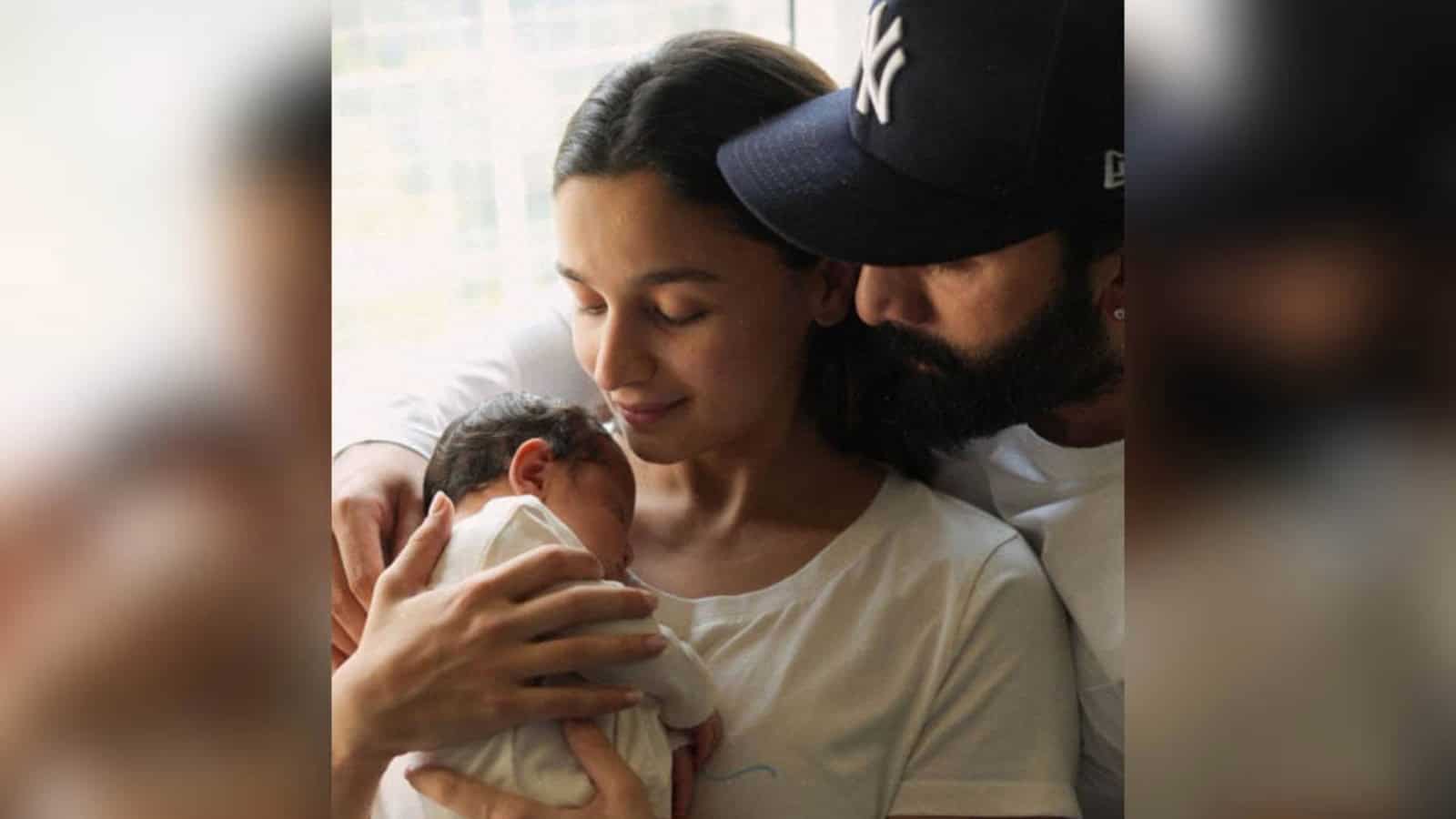 Alia Bhatt and Ranbir Kapoor with their newborn, celebrating their growing family.