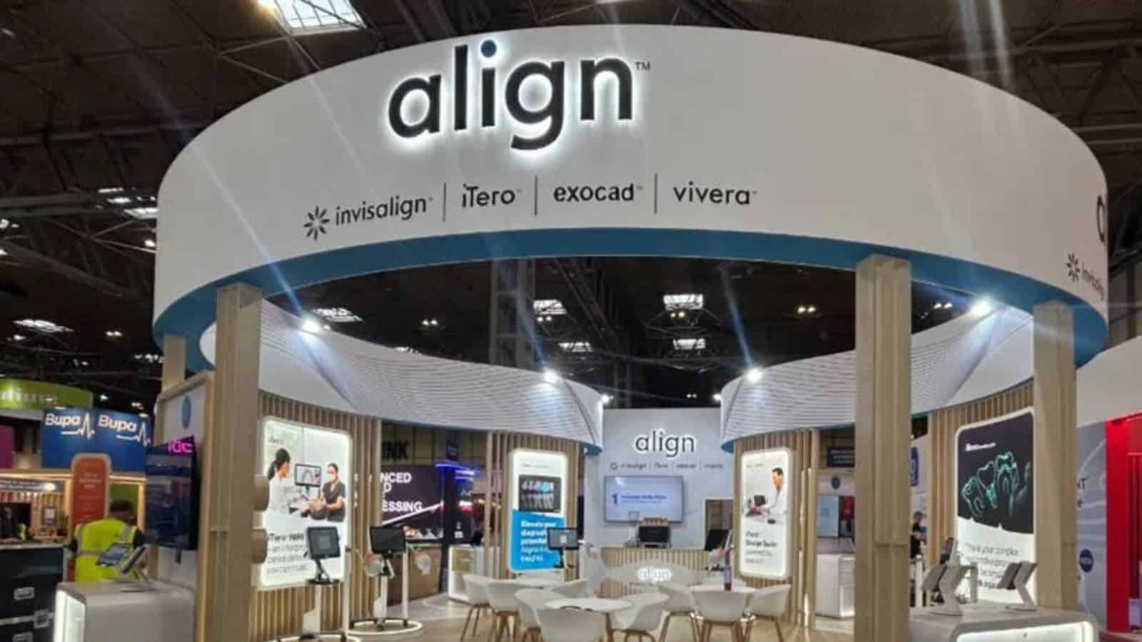Trade show booth for Align Dental Care featuring Invisalign, iTero, Exocad, and Vivera products.