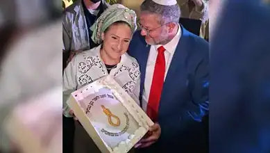 Israeli minister Itamar Ben-Gvir and his wife hold a birthday cake featuring a noose symbol at a private celebration.
