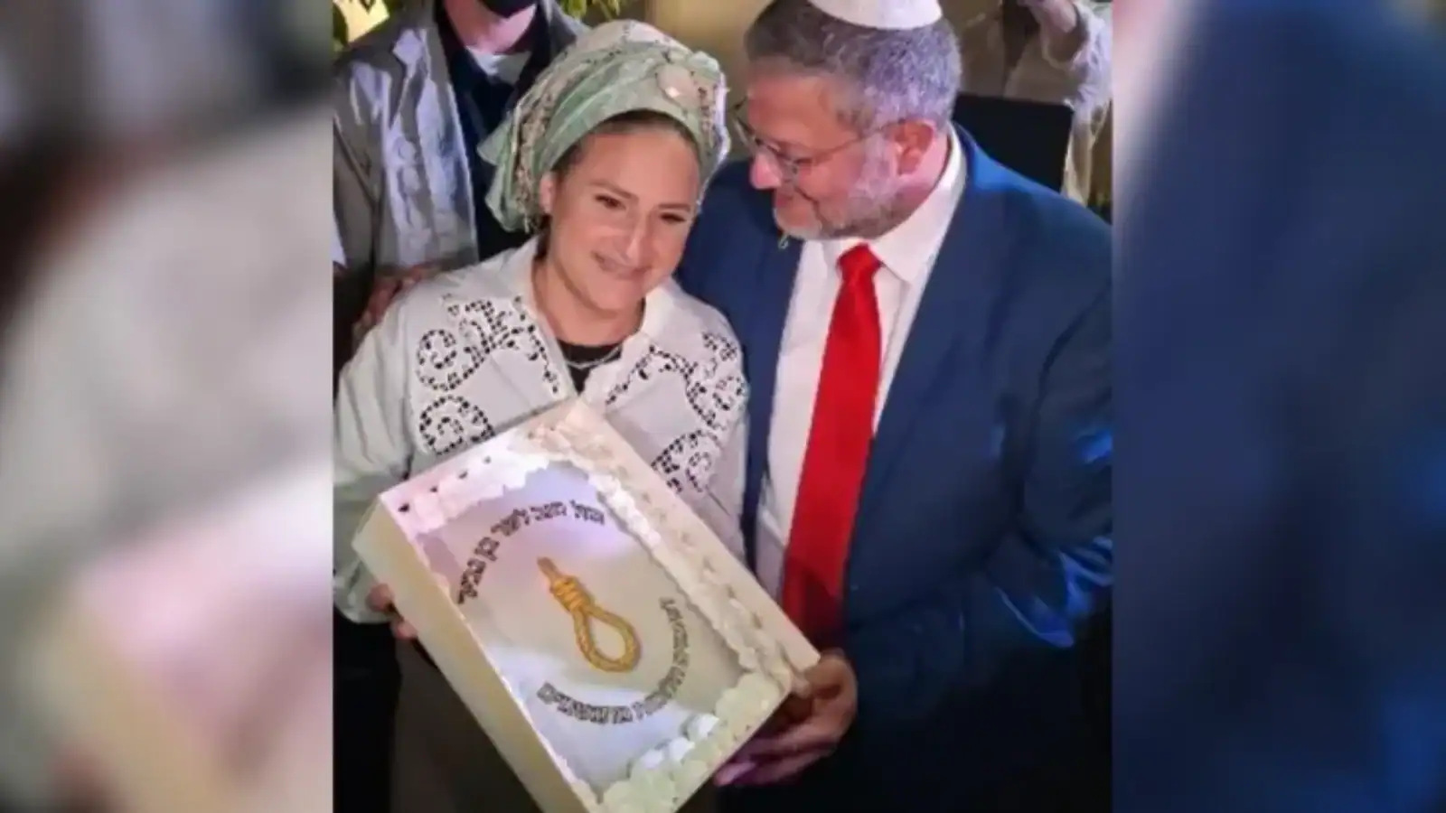 Israeli minister Itamar Ben-Gvir and his wife hold a birthday cake featuring a noose symbol at a private celebration.
