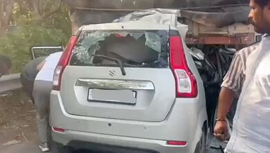 Accident scene showing a damaged white car after a crash on Shamshabad ORR, Hyderabad.