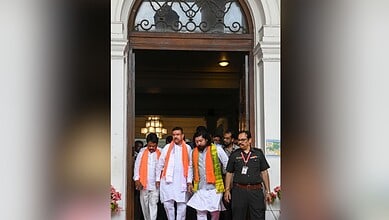Kolkata: West Bengal Chief Minister Suvendu Adhikari with state Cabinet Minister Nisith Pramanik and others after the oath-taking ceremony of the newly-elected MLAs in the state Legislative Assembly, in Kolkata, Wednesday, May 13, 2026. (PTI Photo)