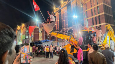 bulldozer brought down in a BJP rally in the New Market area