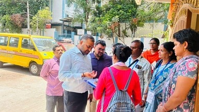 Group of Hyderabad residents and officials discussing Census 2027 self-enumeration process.