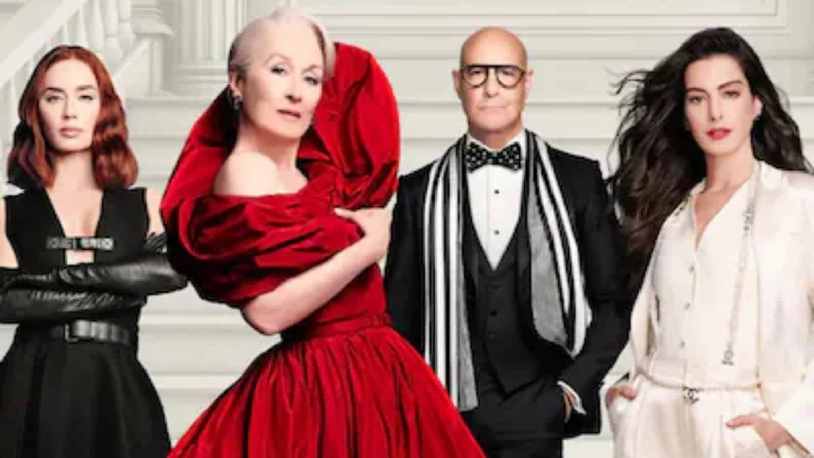 Four actors from The Devil Wears Prada 2 cast posing on stairs in stylish outfits.