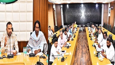 The Siasat Daily: Business meeting with diverse professionals in a modern conference room.