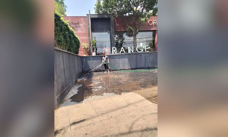 Outdoor cleaning activity at The Siasat Daily office premises.