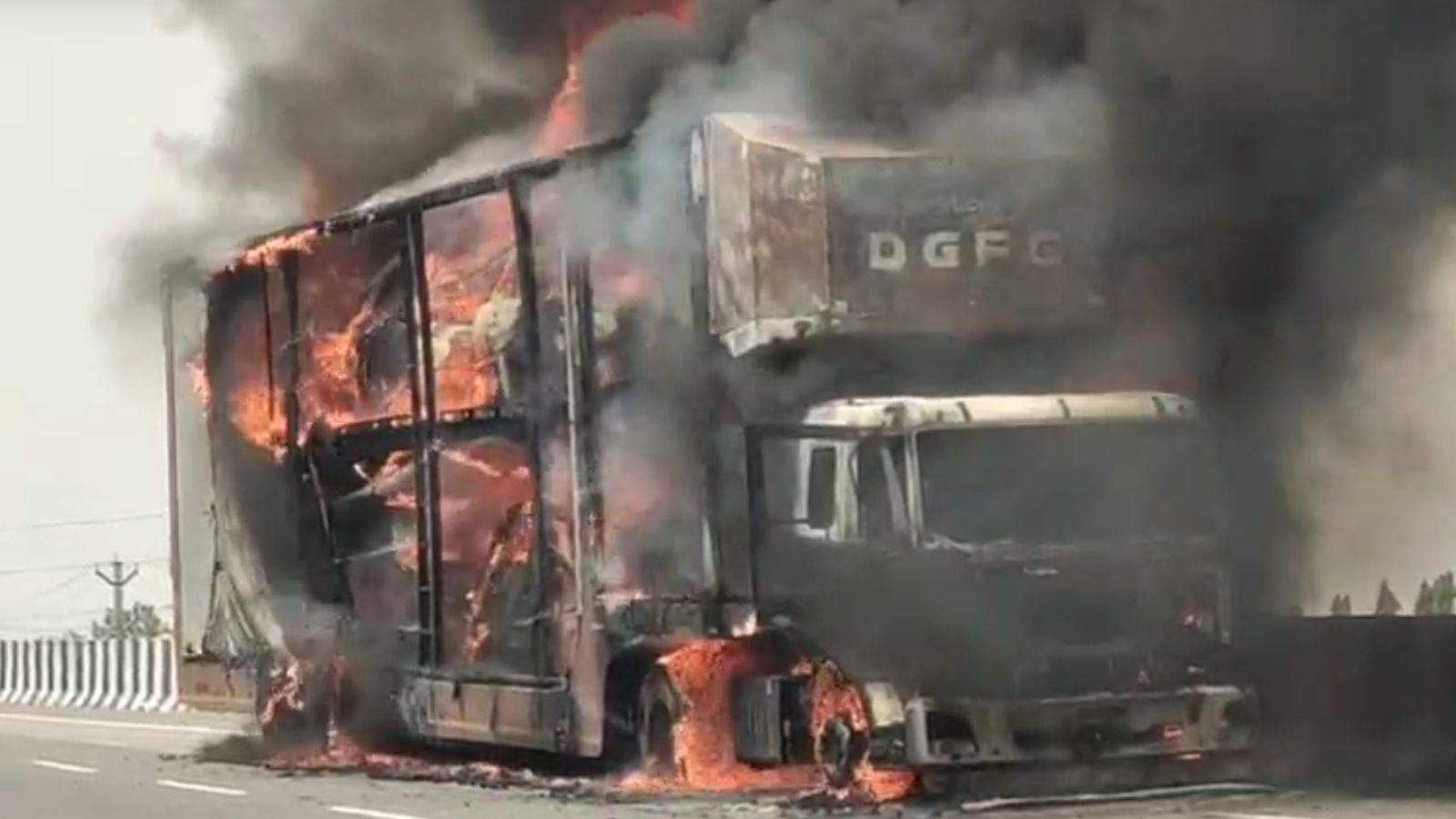 10 Maruti cars reduced to ashes after container truck catches fire in Medak