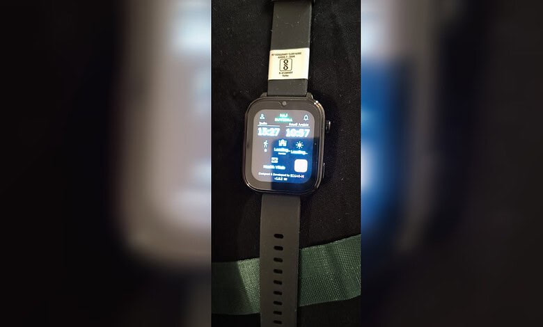 Close-up of the Haj Suvidha Smartwatch distributed to Indian Haj pilgrims during Haj in Saudi Arabia.