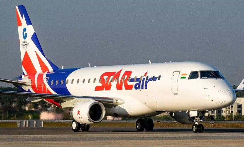 SIAir commercial airplane taxiing on runway at airport, ready for takeoff or landing.