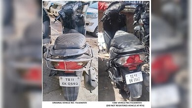 Image shows a scooter with a fake number plate, seized by authorities in Hyderabad.