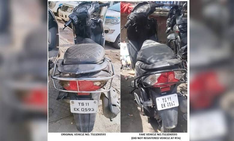 Image shows a scooter with a fake number plate, seized by authorities in Hyderabad.
