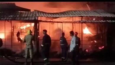 Fire at Kamareddy bus stand destroys 12 shops, emergency services respond to the blaze.