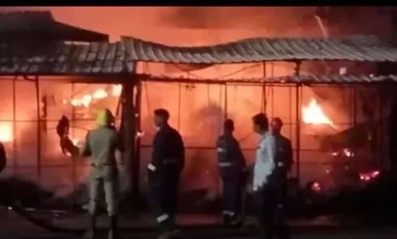 Fire at Kamareddy bus stand destroys 12 shops, emergency services respond to the blaze.