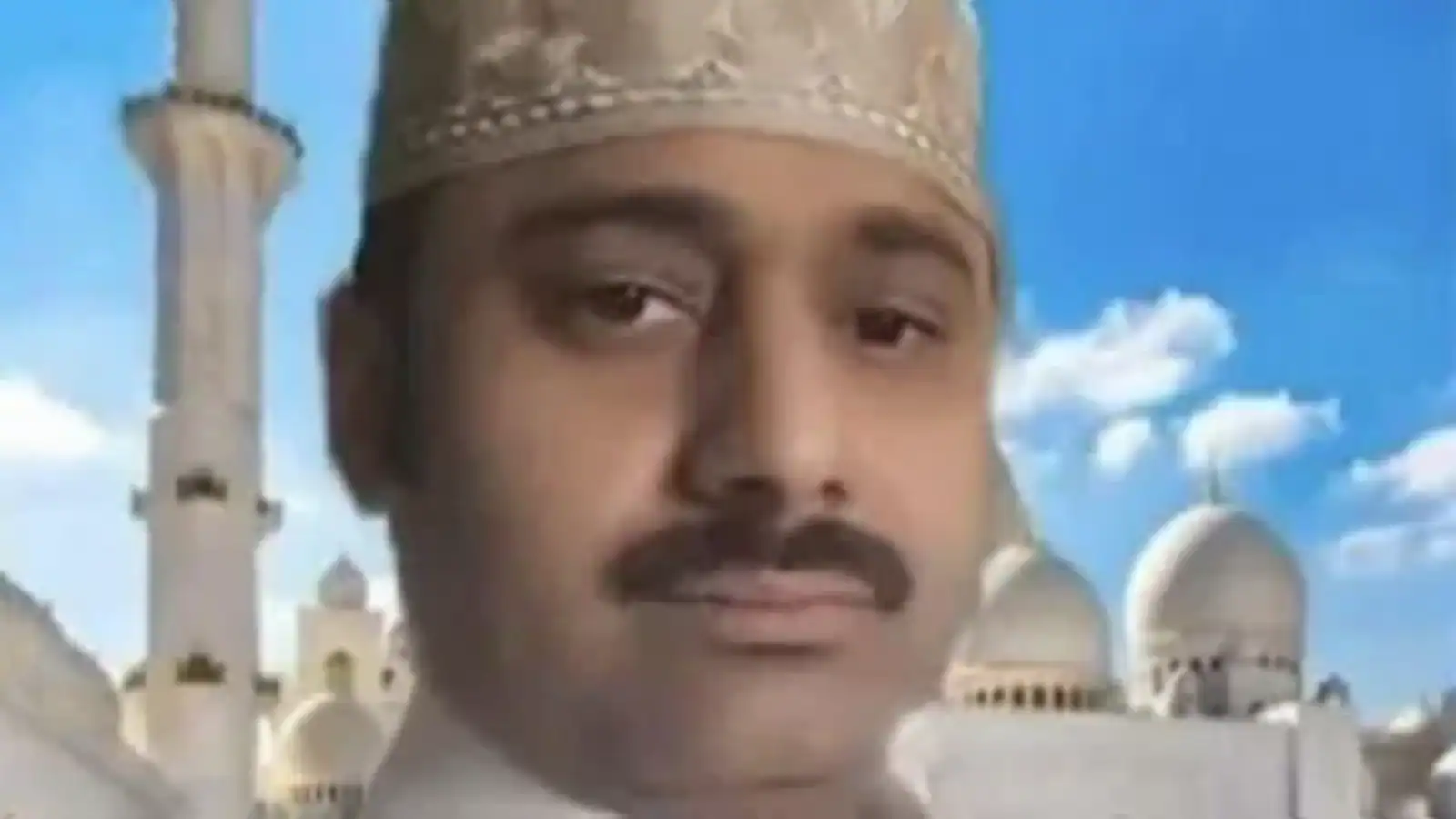 Photo of Kerala man Abdul Rahim wearing a traditional cap.