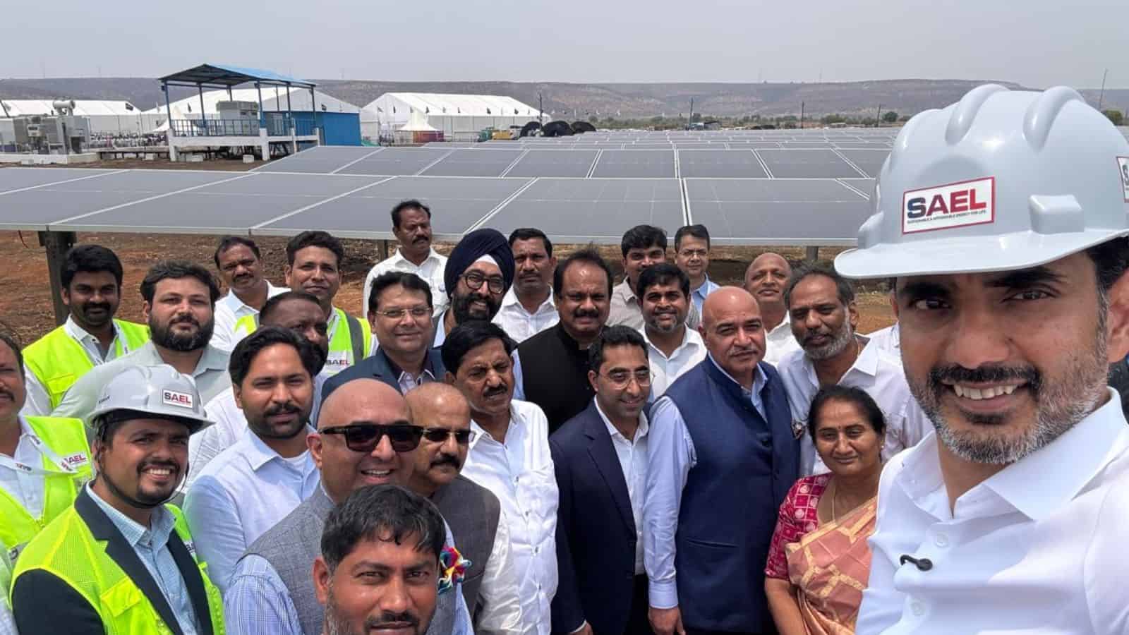 Innovative solar power plant visit with diverse team of professionals outdoors in bright sunlight.