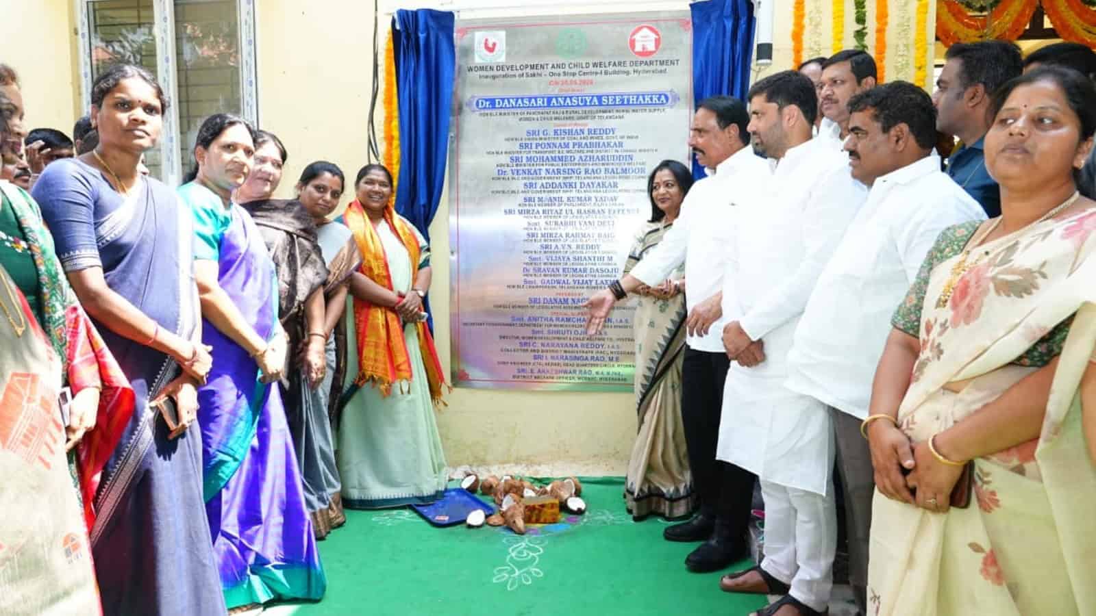 The Siasat Daily: Community event unveiling new public notice board with local officials and residents.