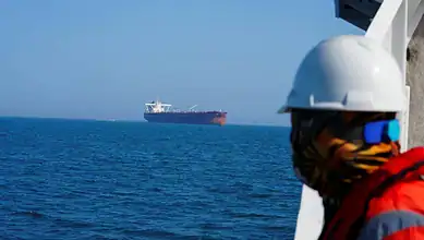 Iran warns of heavy assault on US assets over tanker attacks, amid rising tensions in the Gulf region.