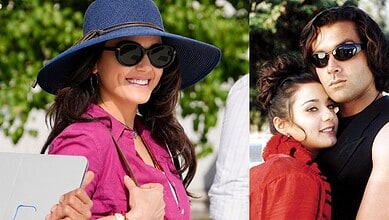 Preity Zinta and Bobby Deol together during a public event, smiling and enjoying each other's company.