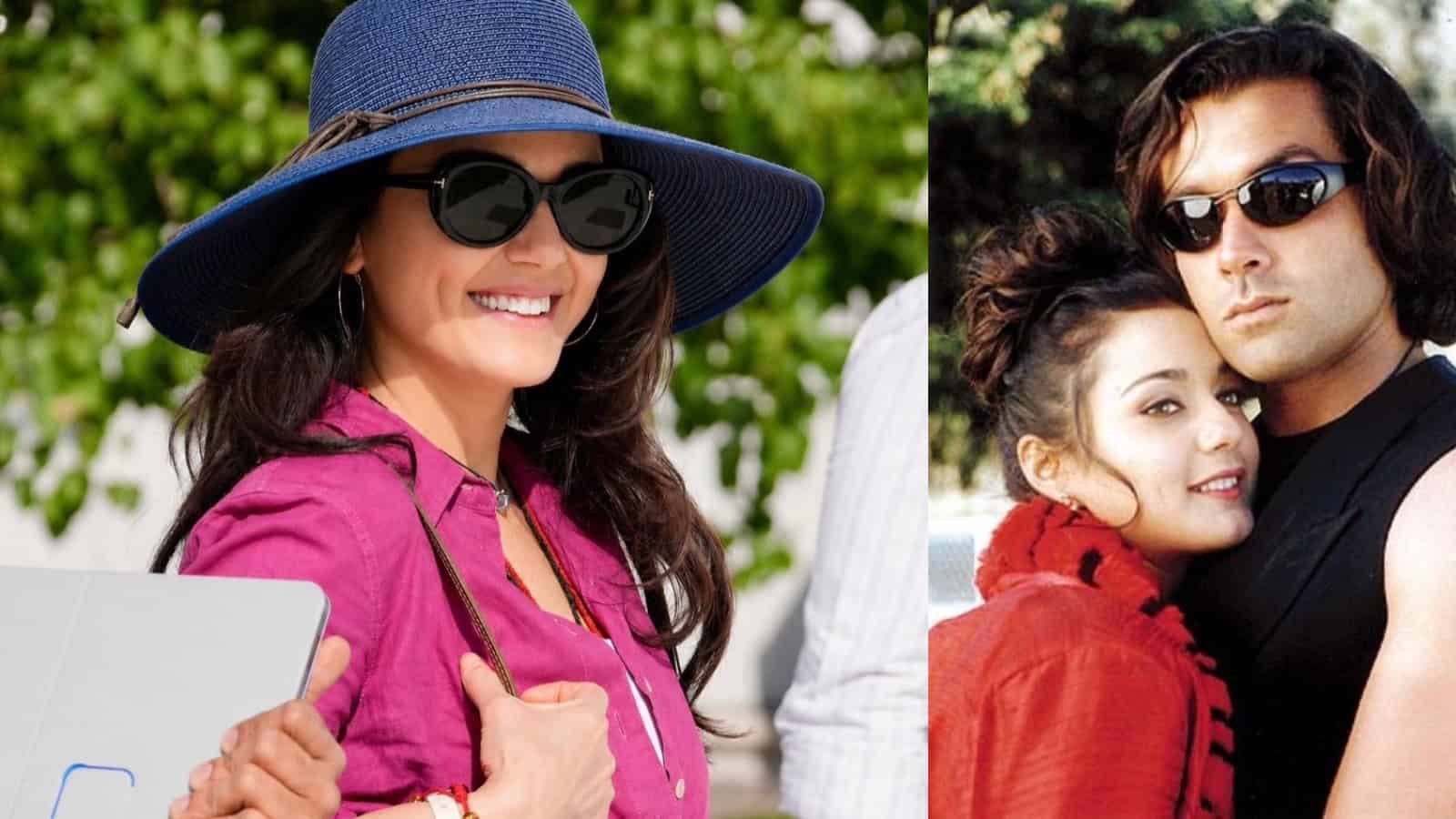 Preity Zinta and Bobby Deol together during a public event, smiling and enjoying each other's company.